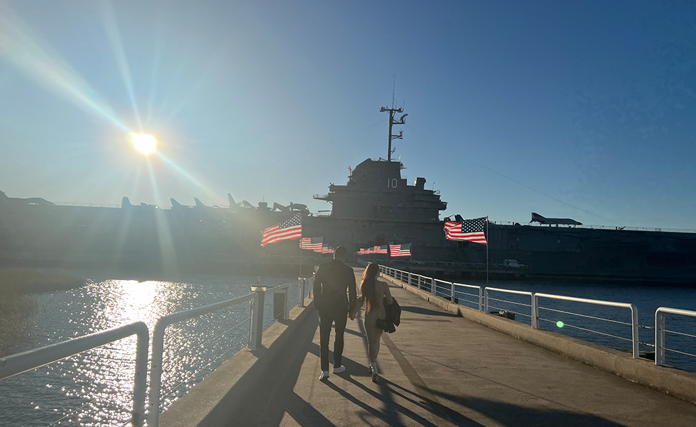 Couple walking to the USS Yorktown at the Medal of Honor Leadership and Valor Dinner